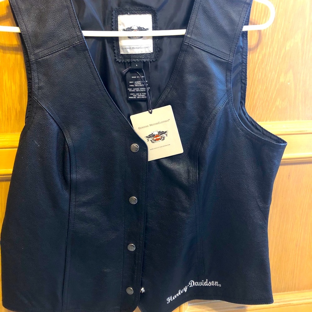 Women’s L  Harley Davidson leather vest .